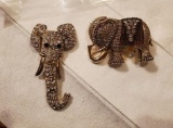 2 elephant pins or broches`