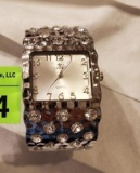 silver and rhinestone bracelet watch