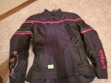 Scorpion Exo Jacket Women's Large. Includes armor pads and is water proof. Black with red roses.