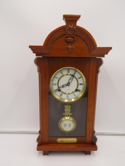 Canterbury 31 day striking pendulum wall clock with a plaque on the front that reads NO.00398. Made