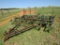 John Deere 1010 12ft chisel with rear hitch and Harrah attachments and walking axles
