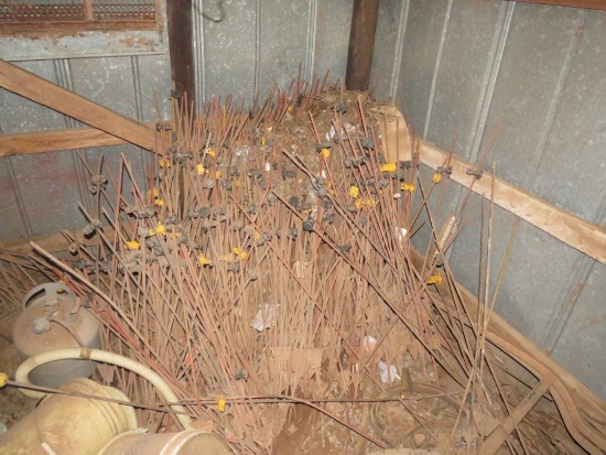 Hundreds of electric T post some with insulator