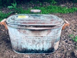 Vintage copper metal bucket with lid featuring wooden handles on each side and on lid