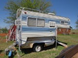 Truck bed camper. Contains not included.