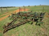John Deere 1010 12ft chisel with rear hitch and Harrah attachments and walking axles