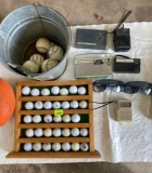 Golf balls, baseballs, football, five transistor radios and two pairs sunglasses
