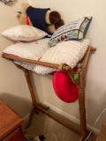 Quilt rack with pillows