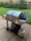 Gas Grill with Empty Propane Tank & Grill Tools
