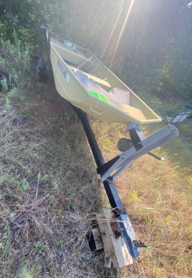 14 foot flat bottom boat and trailer. Has title....
