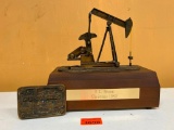 Oil Pump Music Box & Portadrill Belt Buckle