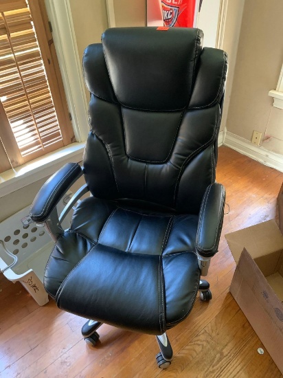 black leather office chair looks new