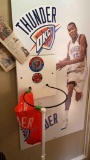 Thunder poster and basketball rim