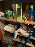 shelf contents - grader, pans, cleaning supplies and more