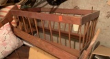 wooden crib may be missing some pieces