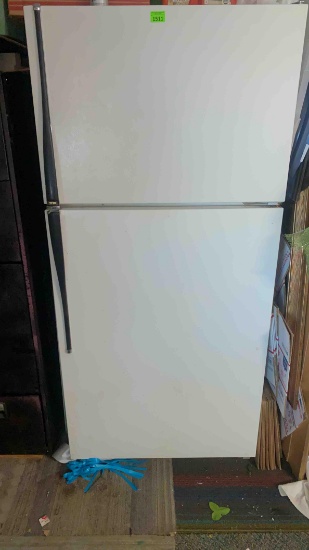 Hot point refrigerator 64 inches high 29 and three eights wide 31 1/2 inch deep including handles