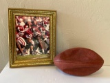 Billy Sims Autographed Football & Framed OU Sooner Football Photograph