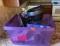 Purple tub with small black fan, home phone, and more...