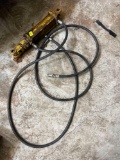 Hydraulic cylinder and hoses
