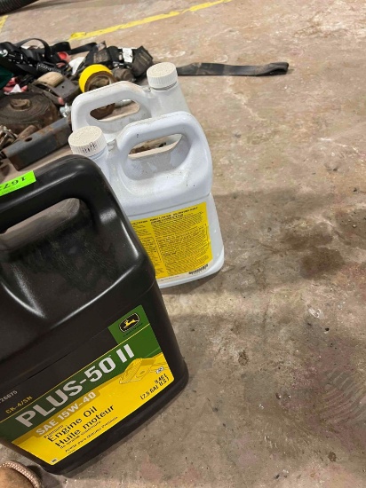 John Deere engine oil and anti-freeze. containers may be partial