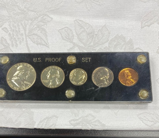 US proof set: Half-dollar, quarter, nickel, dime, and penny.