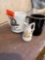 coffee cups and tiny pitcher