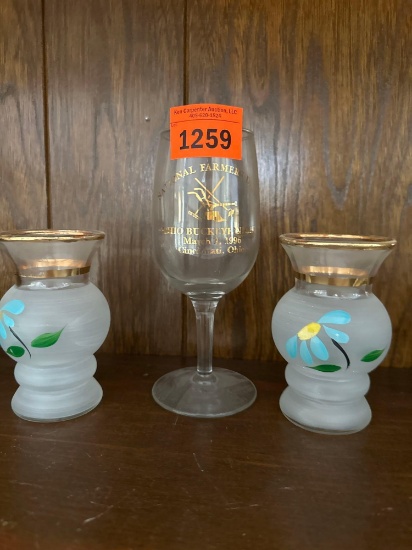 two bud vases and wine glass