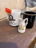 coffee cups and tiny pitcher
