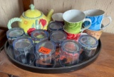 tray of glasses and cups