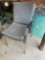 2 grey hard back metal leg chairs