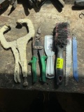 clamp; putty knife; pliers; wire brush
