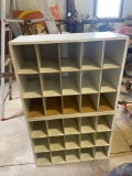 wooden shelf with slots