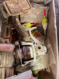 fishing plastic worms, small tackle box and reel