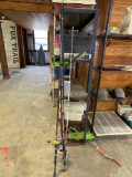3 fishing poles with reels