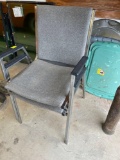 2 grey hard back metal leg chairs