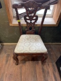 wooden chair with cloth seat