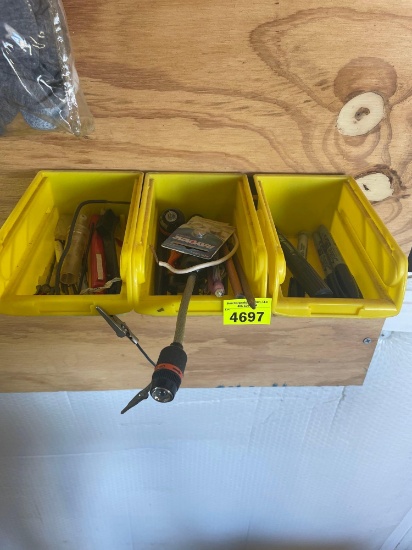 3 hanging storage containers with contents
