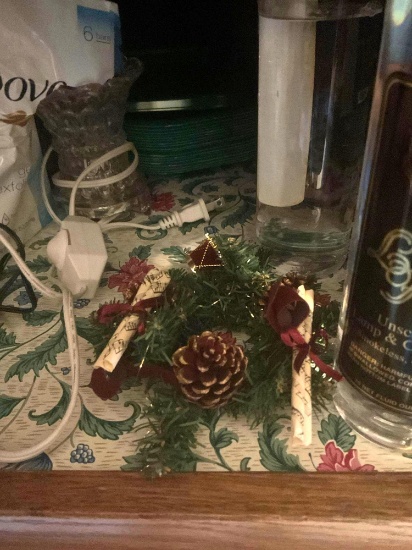 Liquid flame, pencil sharpener, pencils, dove soap, plates, electric candle, decoration