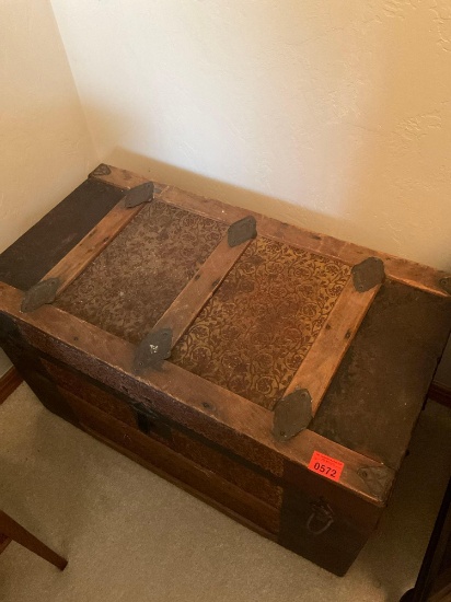 Chest with carpet pieces inside