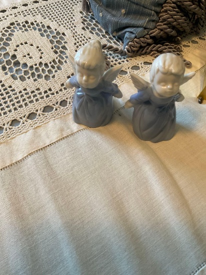 Angels, clock, vase