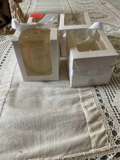 Set of four cheers glasses. Brand new still in boxes