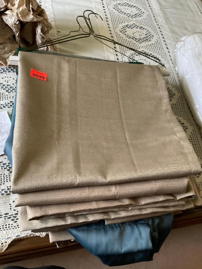 Curtains and tablecloth and one white blanket, in plastic bag