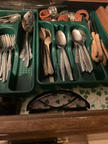 Silverware forks, spoons, butter, knife, steak, knives, and Leather napkin, holders, and sunglasses