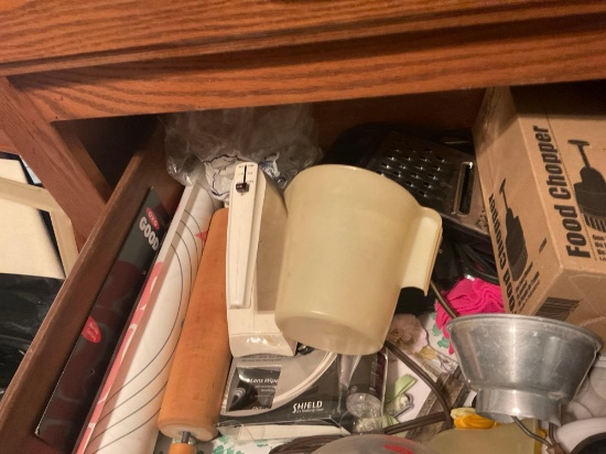 Cheese grater and pencils little change wallets and measuring cup and more this stuff is in two