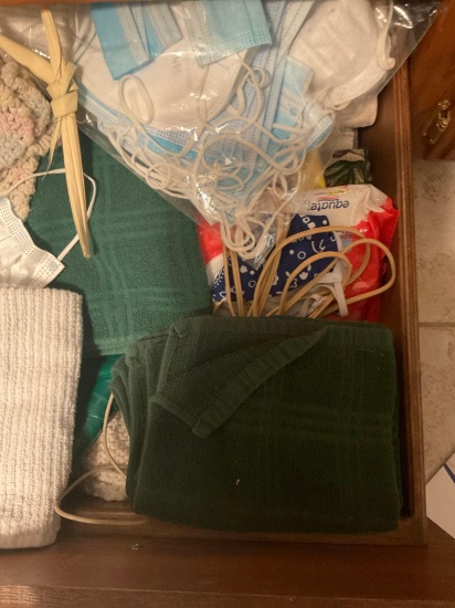 Kitchen towels and some wipes and face mask.