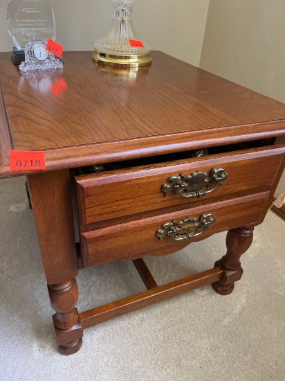Wooden end table with two drawers.