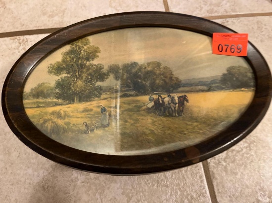 Wall picture of horses lady in the field and what looks like a Jade box with carvings on top