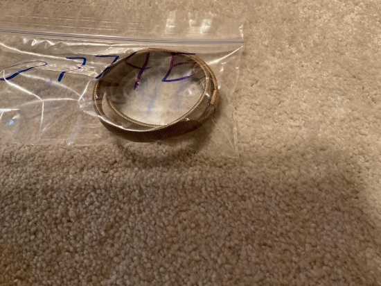 Two stretchy golden bracelets