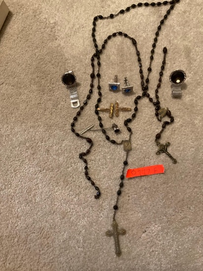 Catholic rosaries and cufflinks