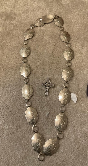 Silver belt cross that goes on a necklace and the clown pendant