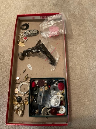 Mismatched earrings and buttons